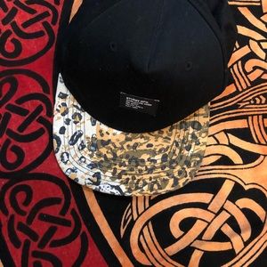 STUSSY black cheetah print rim SnapBack